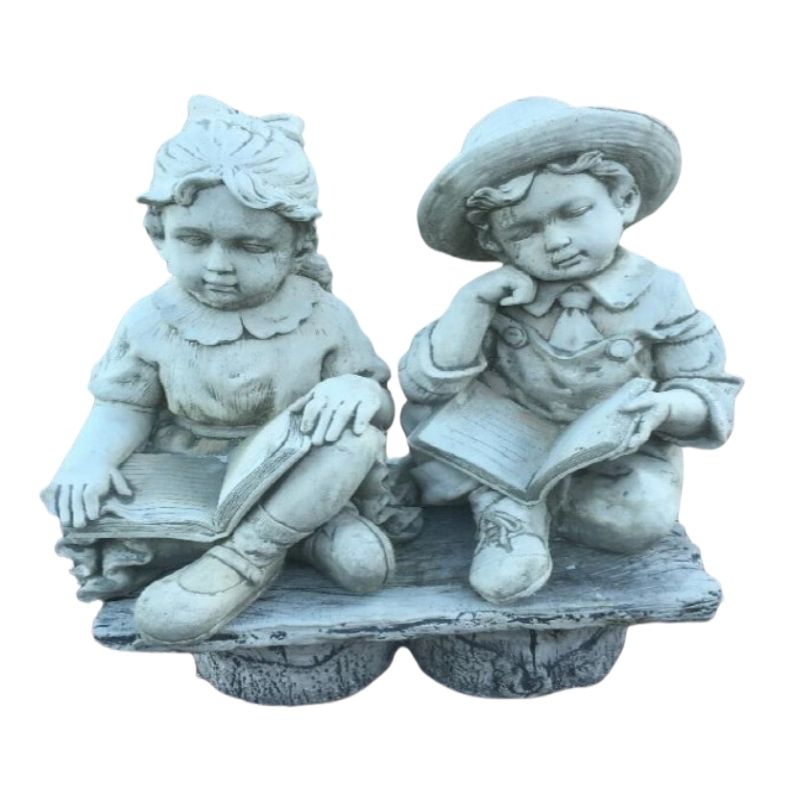 Boy And Girl Sitting Reading On Seat Statue  