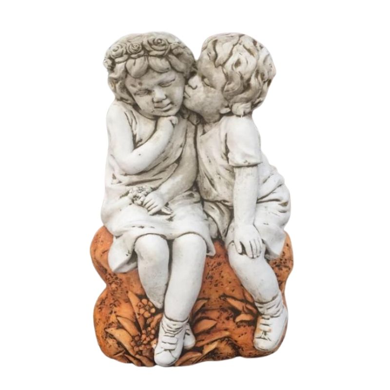 Boy Kissing Girl On Rock Statue  