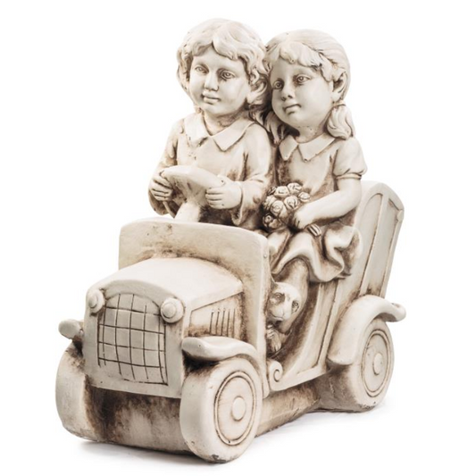 Boy & Girl Driving Statue  